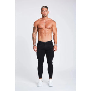 mens black skinny fit stretch denim jeans front view model