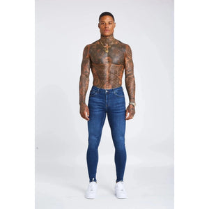 mens dark blue skinny fit stretch denim jeans front view model wearing white sneakers slim fit denim pants