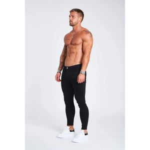 mens black skinny fit stretch denim jeans side view model