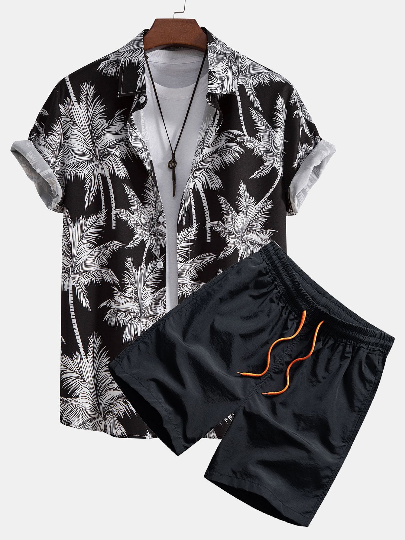 Men’s black tropical shirt and shorts beach outfit